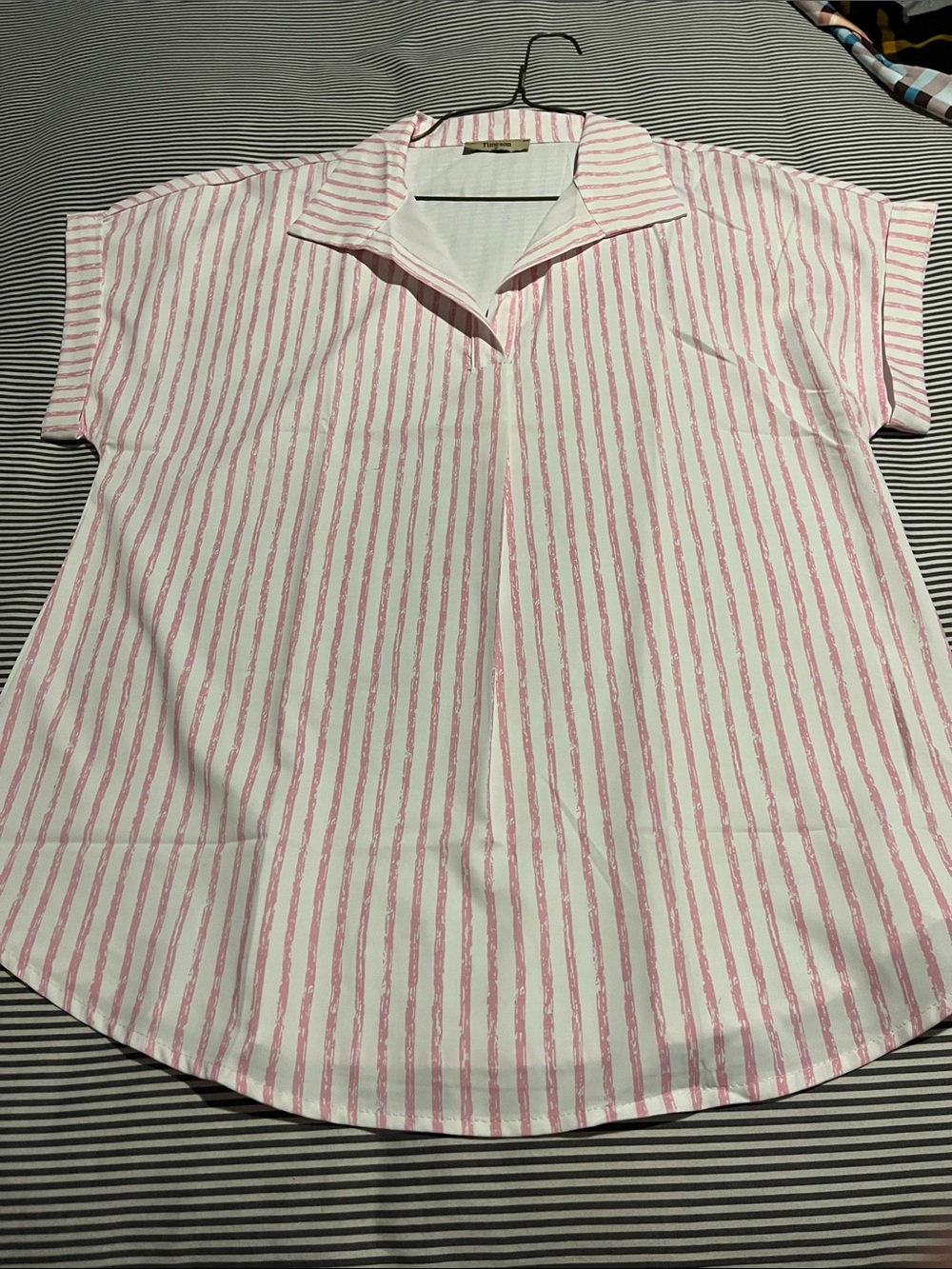 Pin stripe blouse.